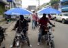 Saison des pluies : La période de gloire des « mototaxis à parapluie »